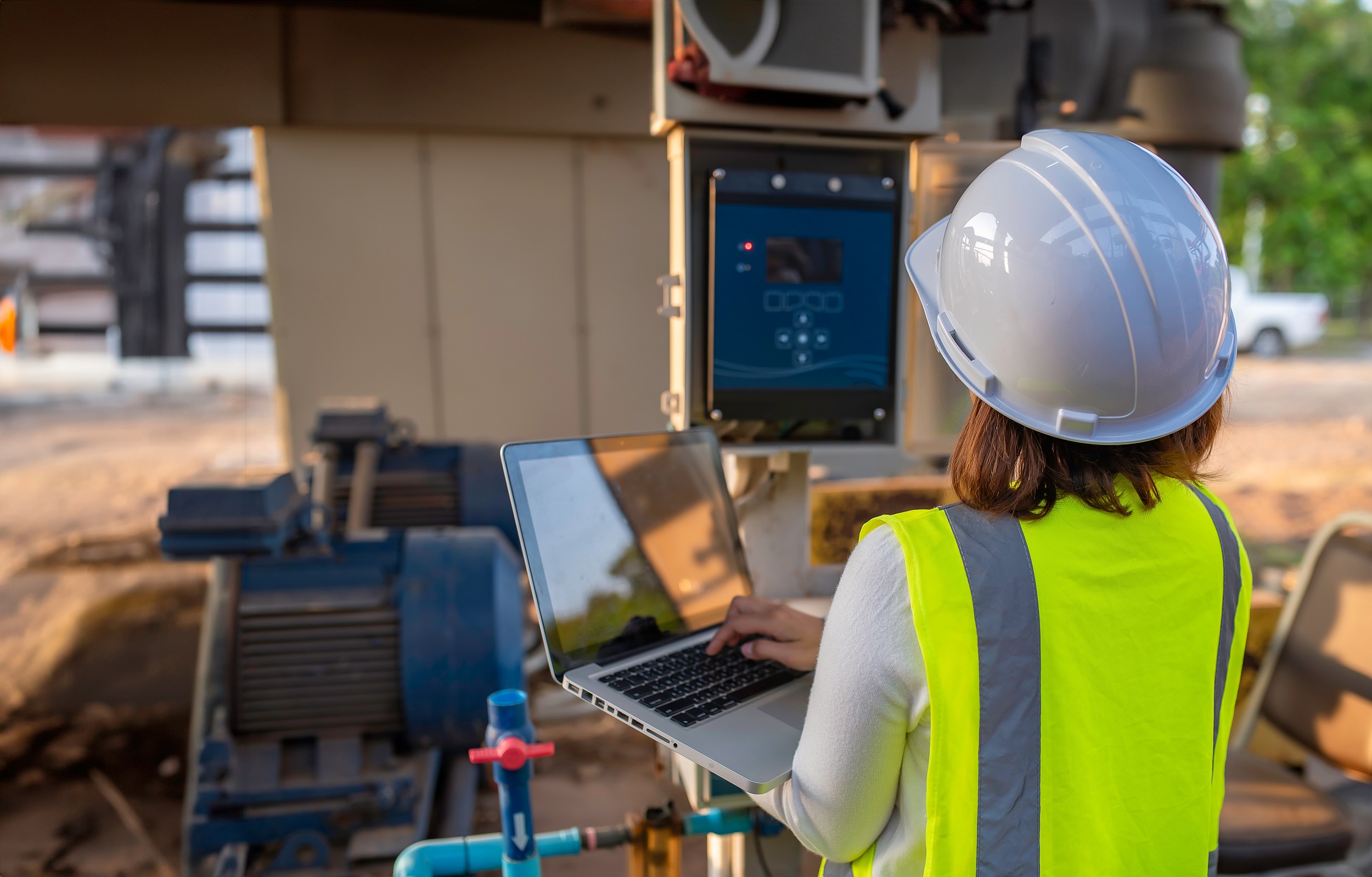 Experienced water industry engineer reviewing infrastructure plans